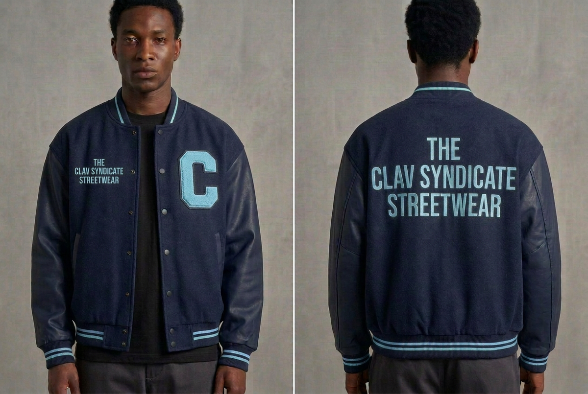 Mörkblå C.L.A.V Syndicate-basebolljacka med ljusblått C, text och ribbdetaljer, fram och bak
